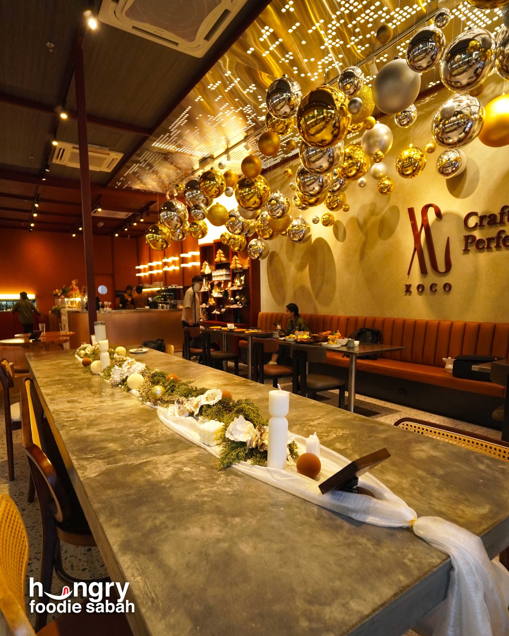 XOCO interior with gold mirror balls
